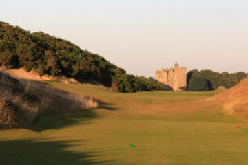 INVERNESS, SCOTLAND - SEPTEMBER 02: The 191 yards par 3, 4th hole with Castle Stuart behind on the Castle Stuart Golf Links on September 2, 2010 in Inverness, Scotland. (Photo by David Cannon/Getty Images)