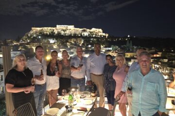 Dinner on a rooftop restaurant overlooking the Acropolis in Athens, Greece